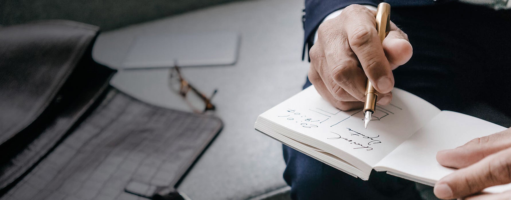 businessman taking notes