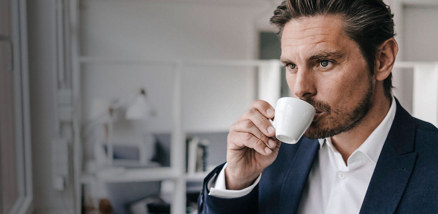 investor drinking coffee